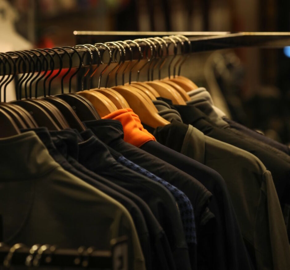 T-shirts on a rack, in the pro shop at Kedleston Park Golf Club